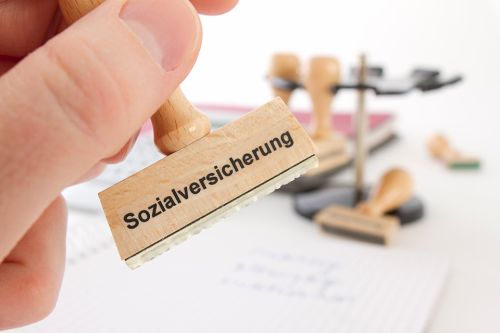 Stempel mit Sozialversicherung beschriftet